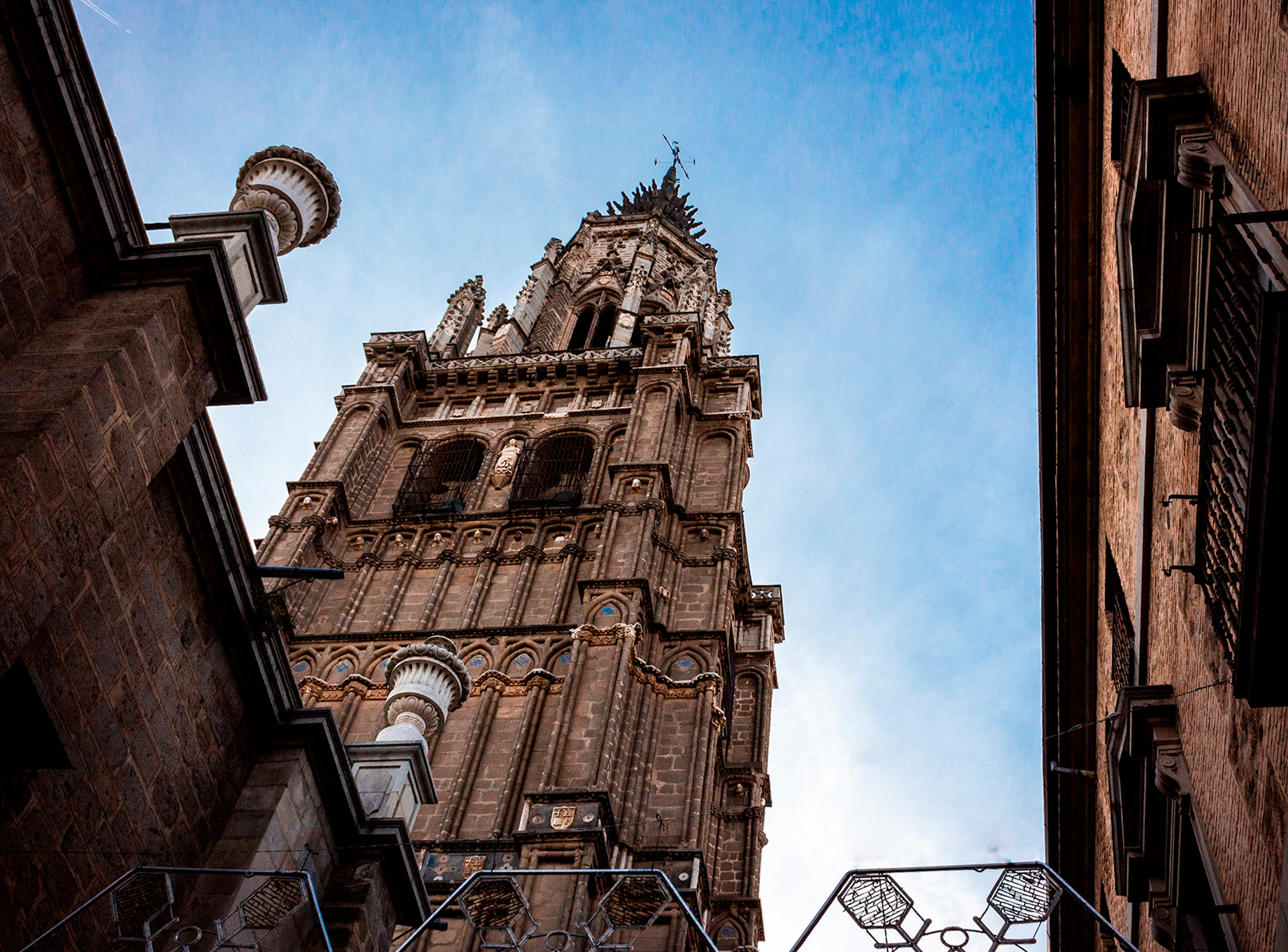 a tall tower with a clock on the top of it