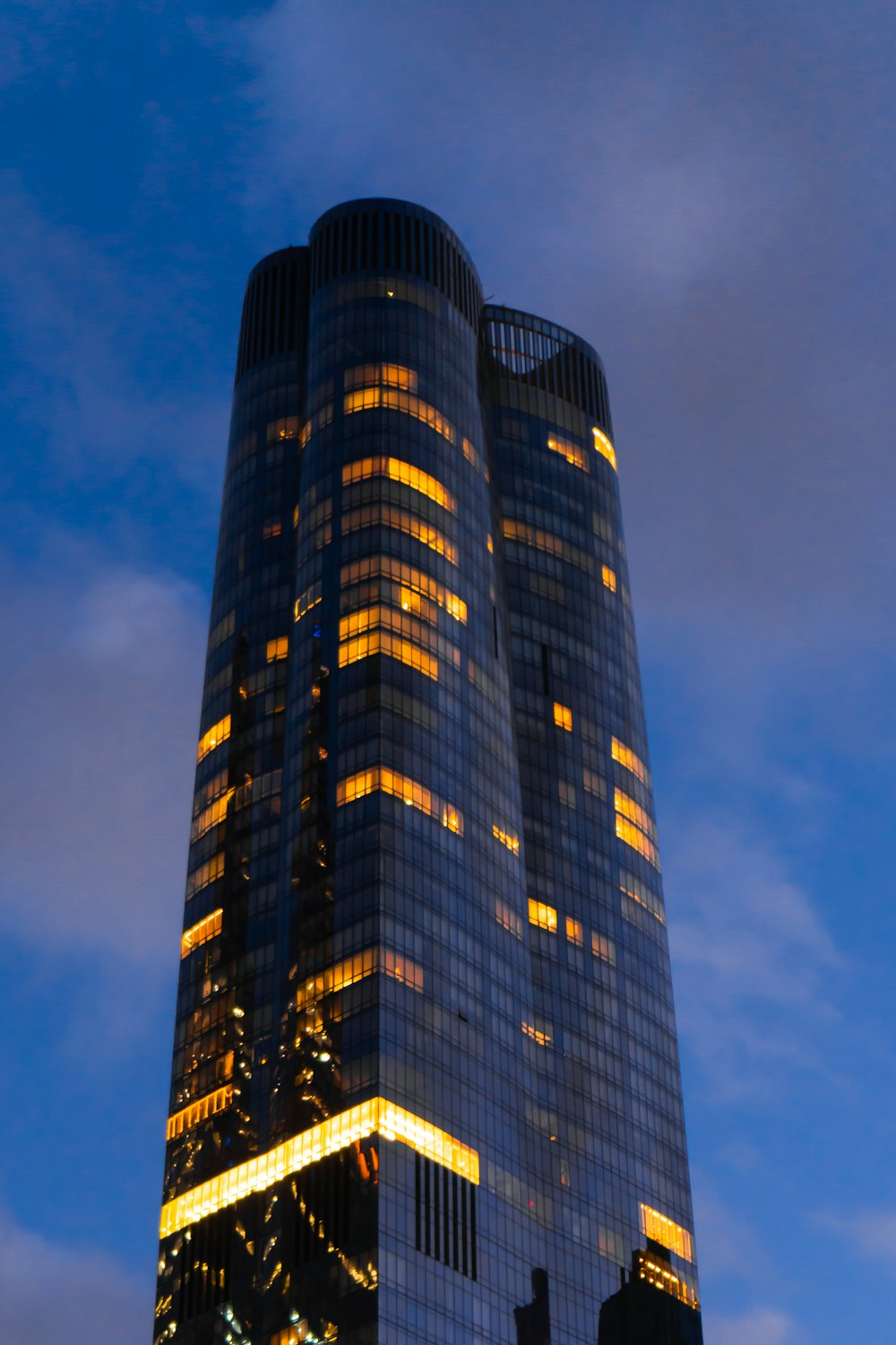 a very tall building lit up at night