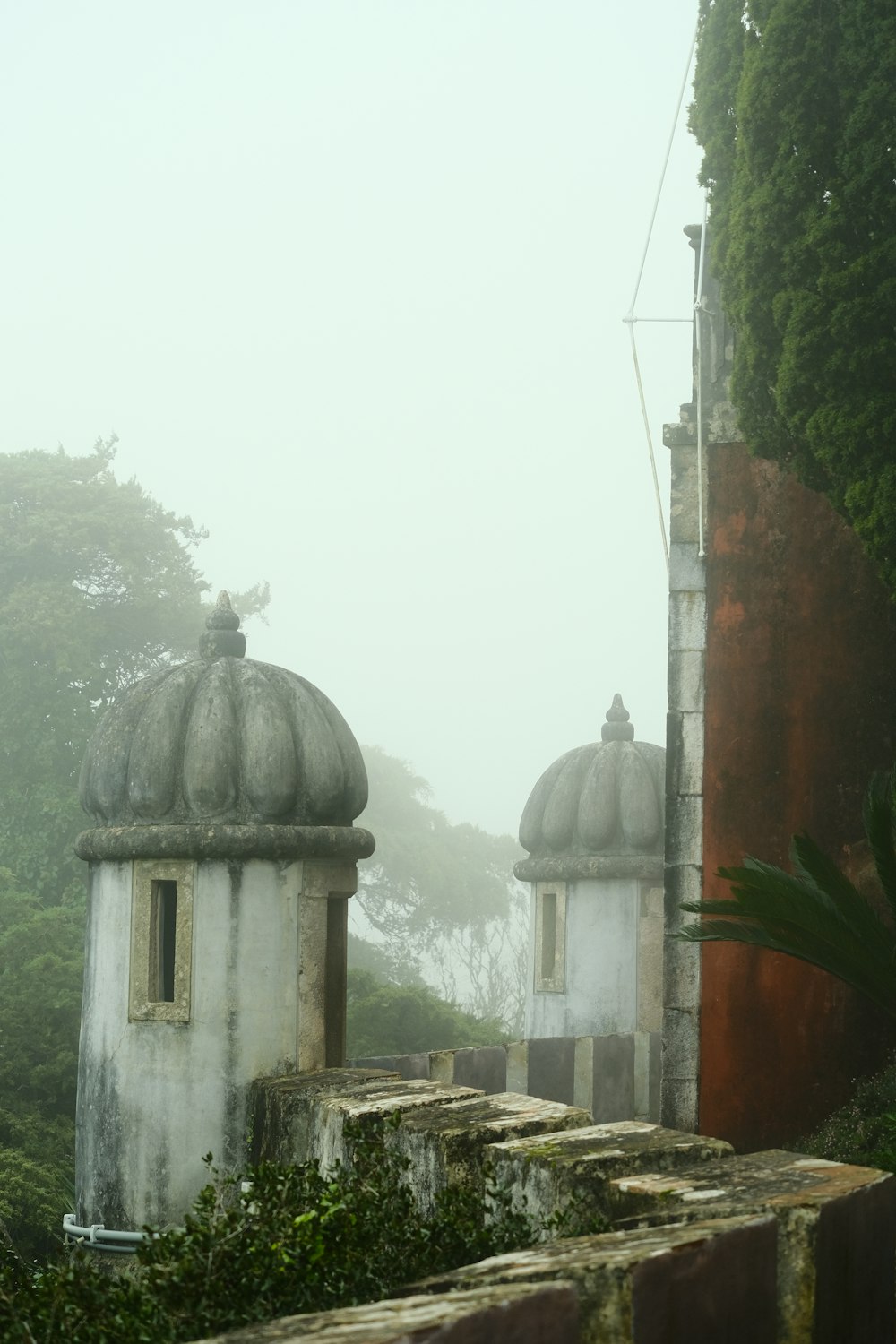 a couple of buildings sitting next to each other