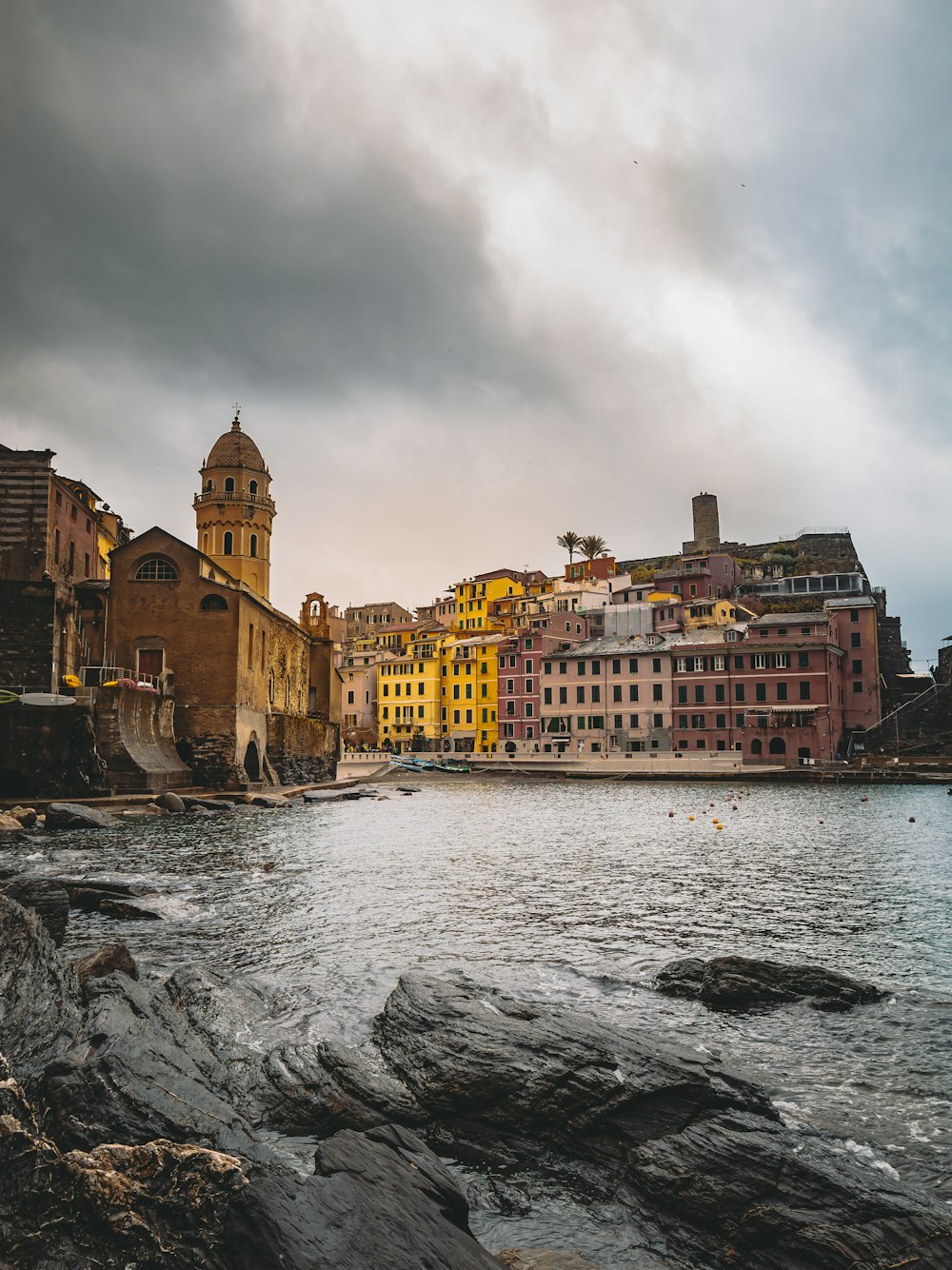 a large body of water surrounded by buildings