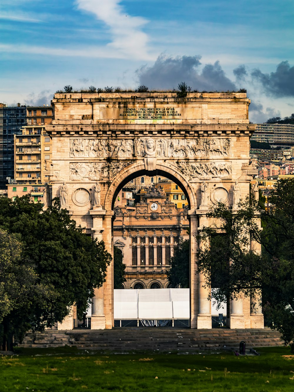 a large building with a massive arch in the middle of it