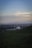 a view of a city from the top of a hill