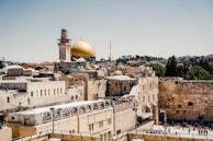 a view of the old city of jerusalem, with the dome of the rock in