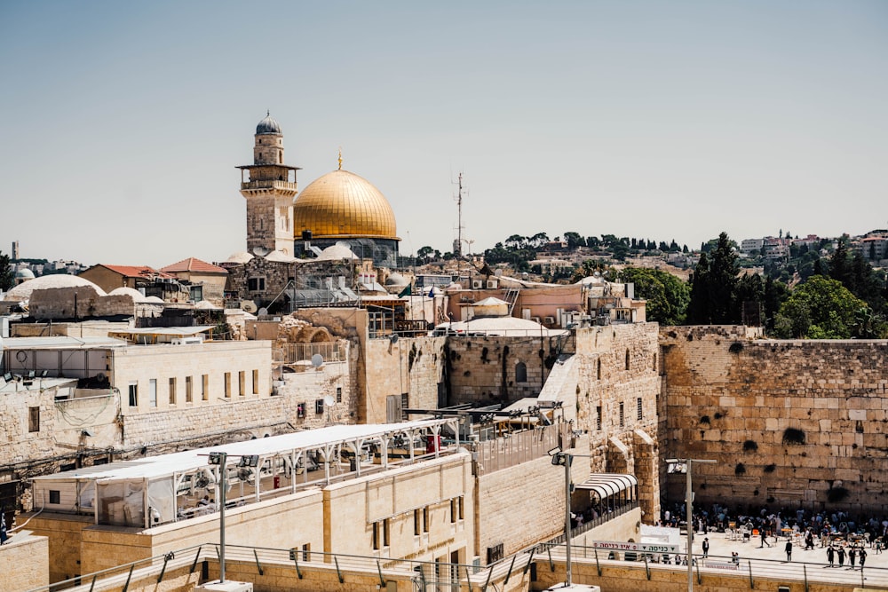 a view of the old city of jerusalem, with the dome of the rock in