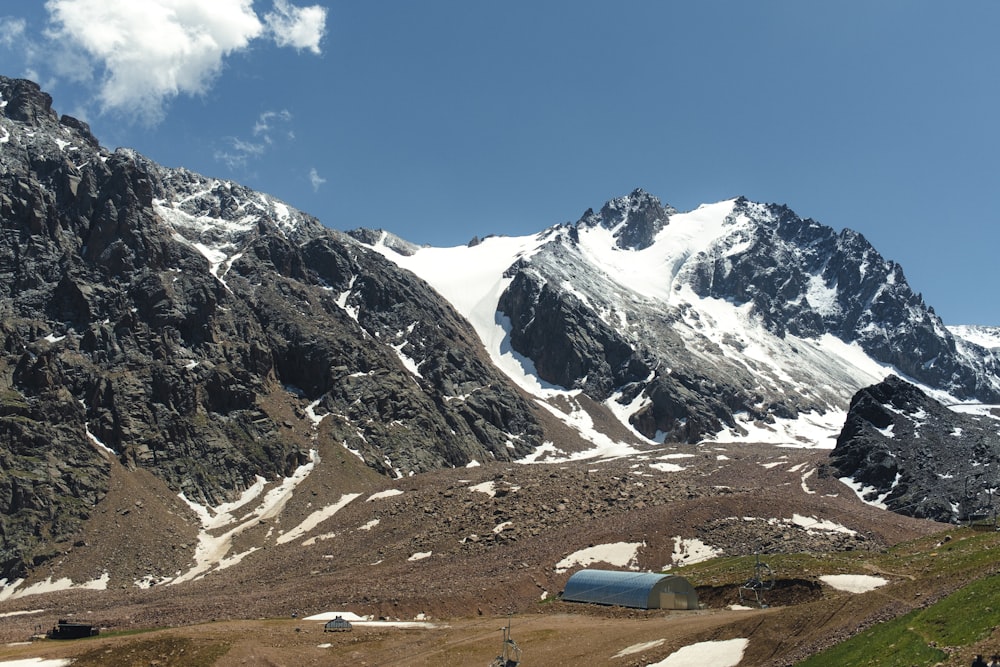 a group of people hiking up a mountain side