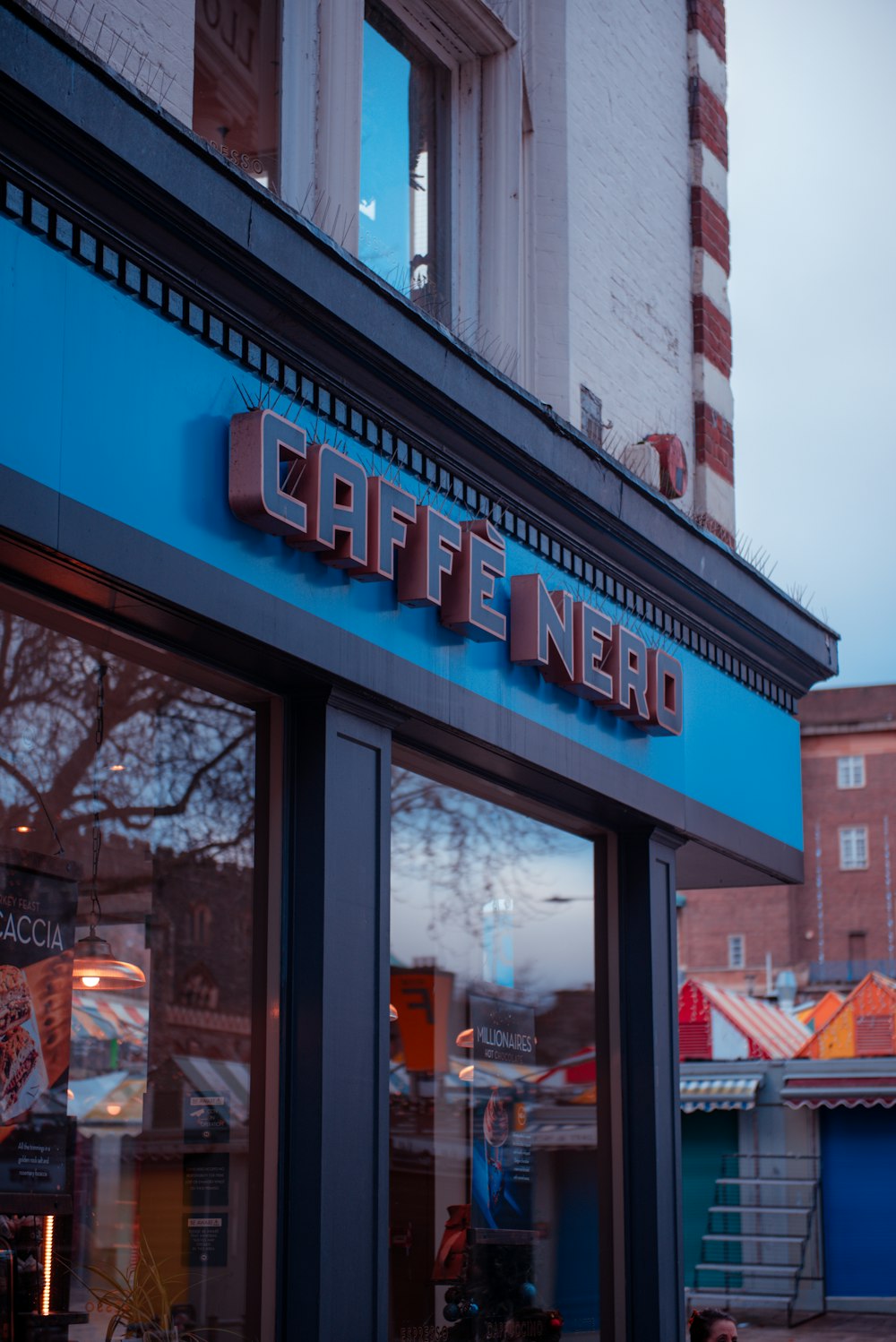 a building with a sign that says caffe nerd