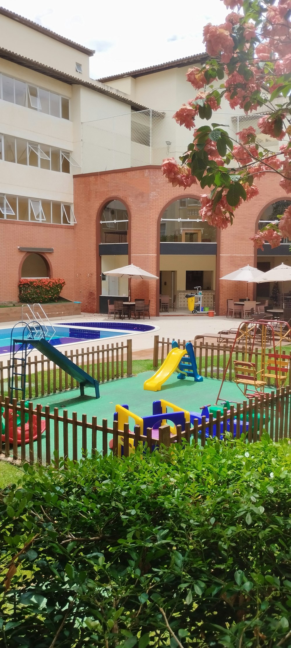 a child's play area in a building with a playground