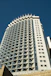 a very tall building with many windows on top of it