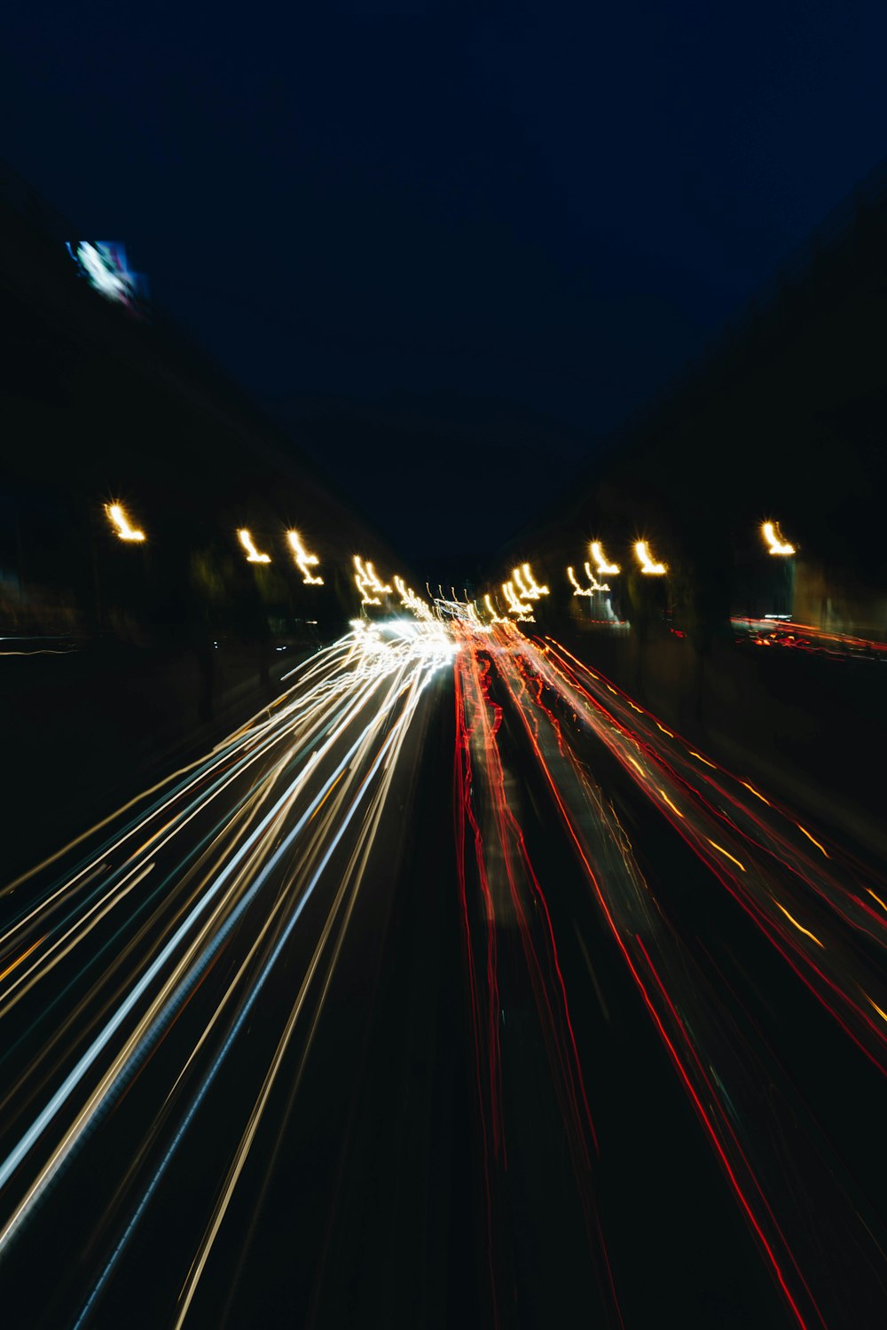 a blurry photo of a city street at night