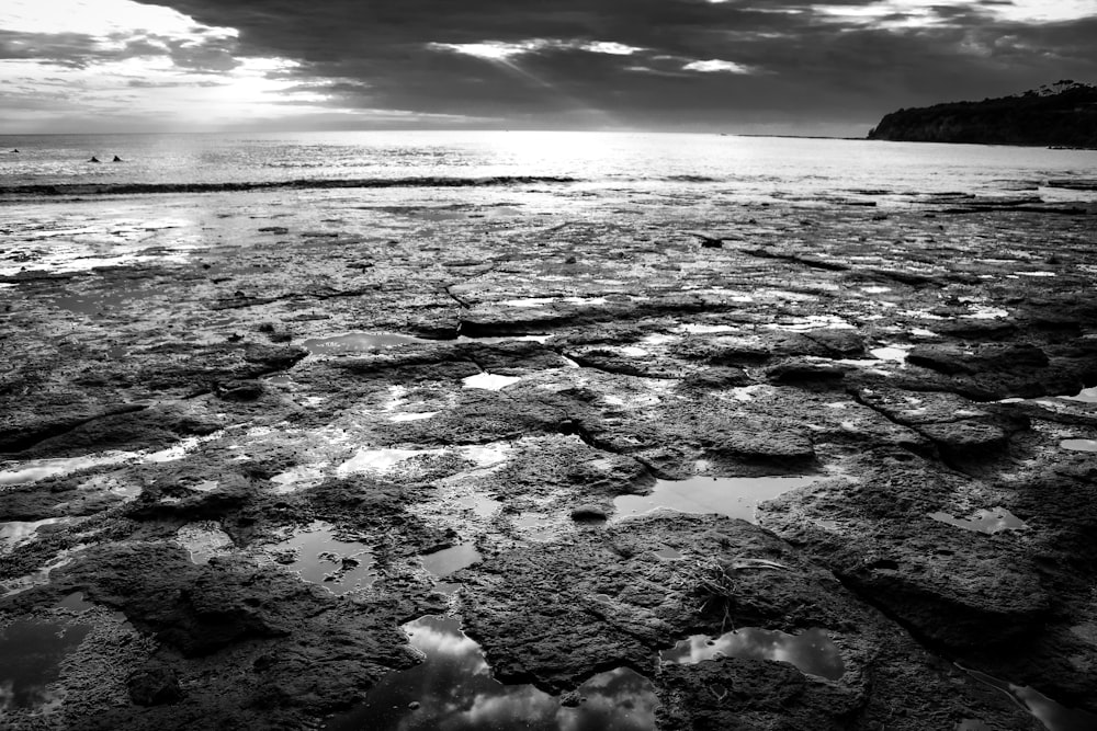 a black and white photo of the ocean