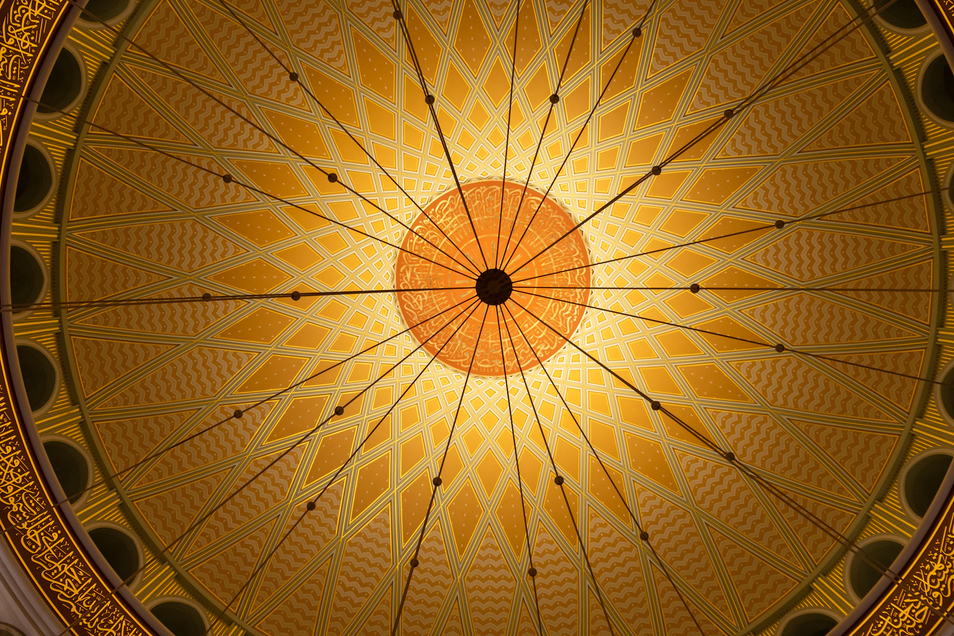 a ceiling in a building with a circular design