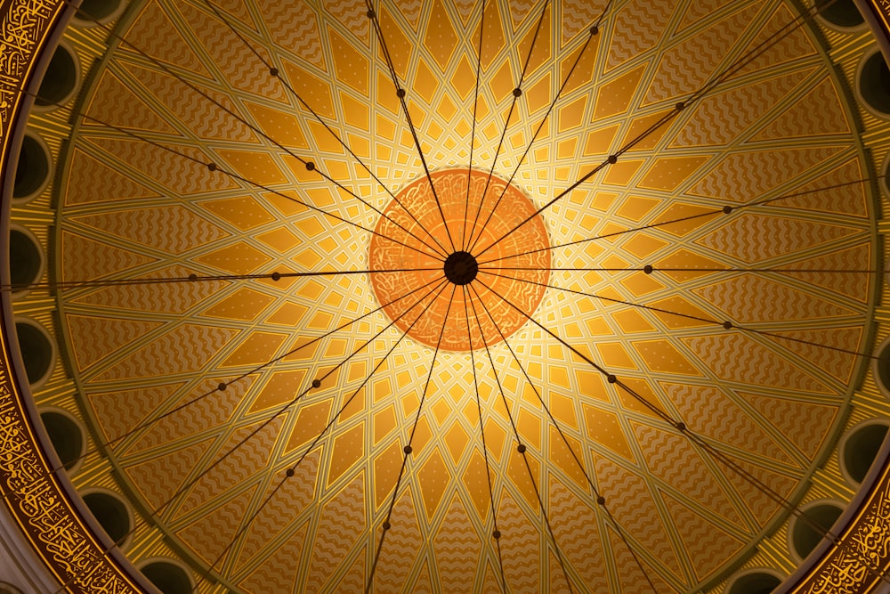 a ceiling in a building with a circular design