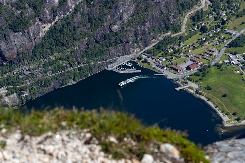 an aerial view of a town and a lake