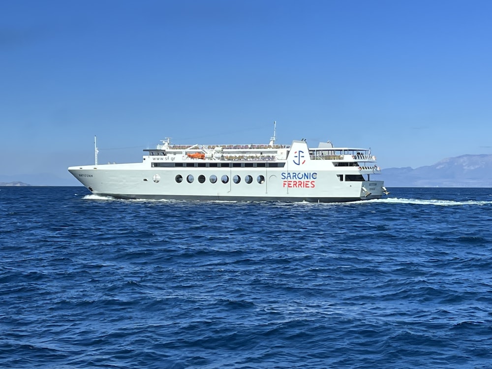 a large white boat in the middle of the ocean