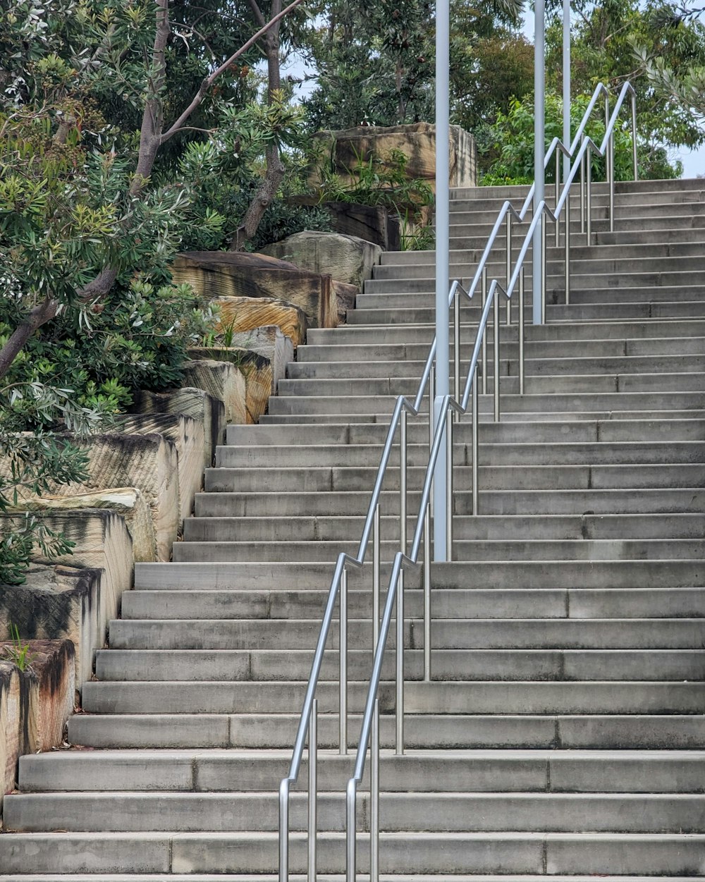 a man riding a skateboard down a set of stairs