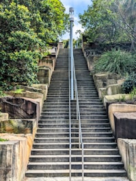 a set of stairs leading up to the top of a hill