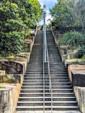 a set of stairs leading up to the top of a hill