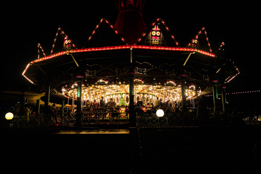 a merry go round lit up at night