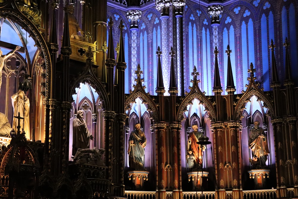 a large cathedral with a statue of jesus on the alter