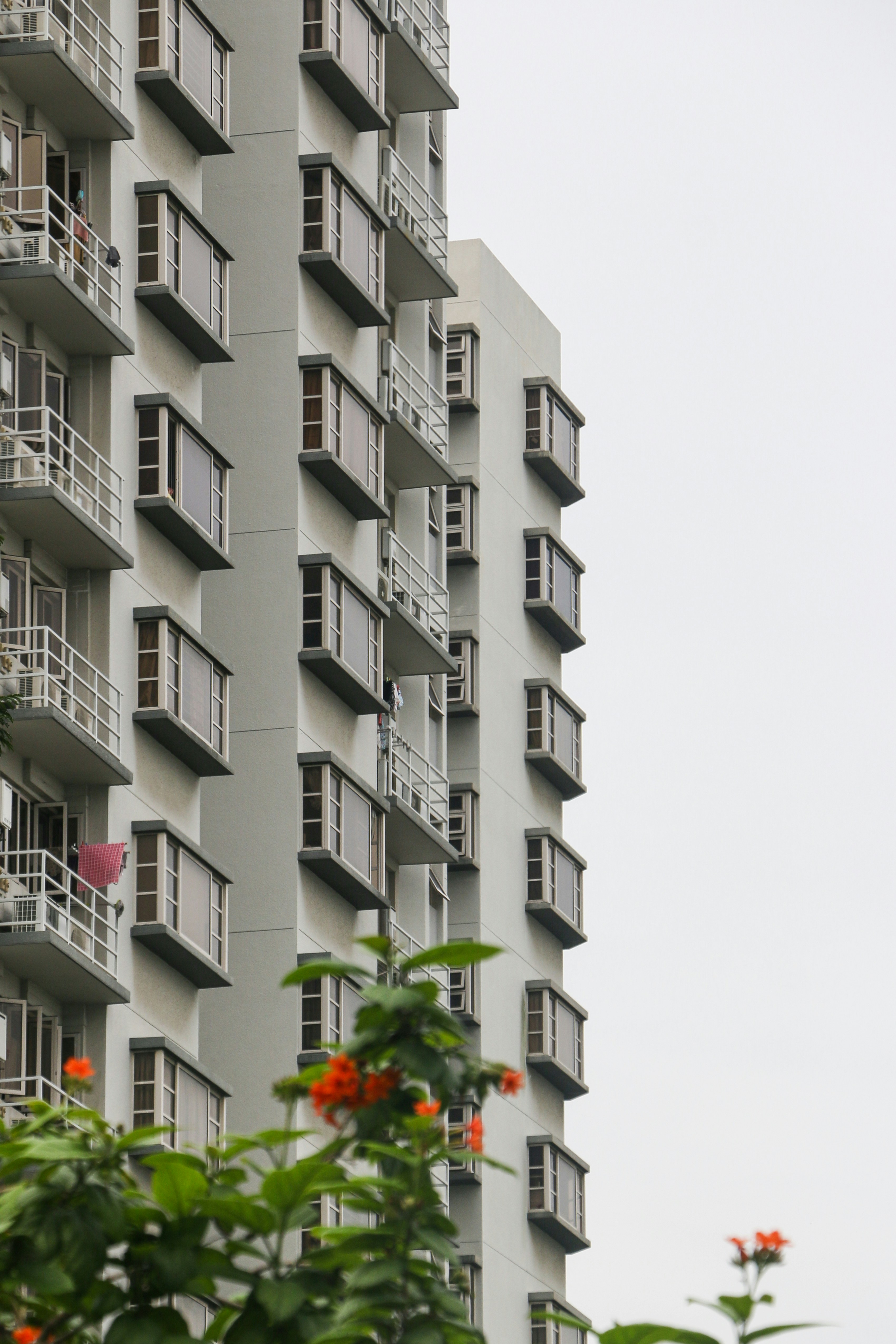 a tall building with balconies and balconies on it