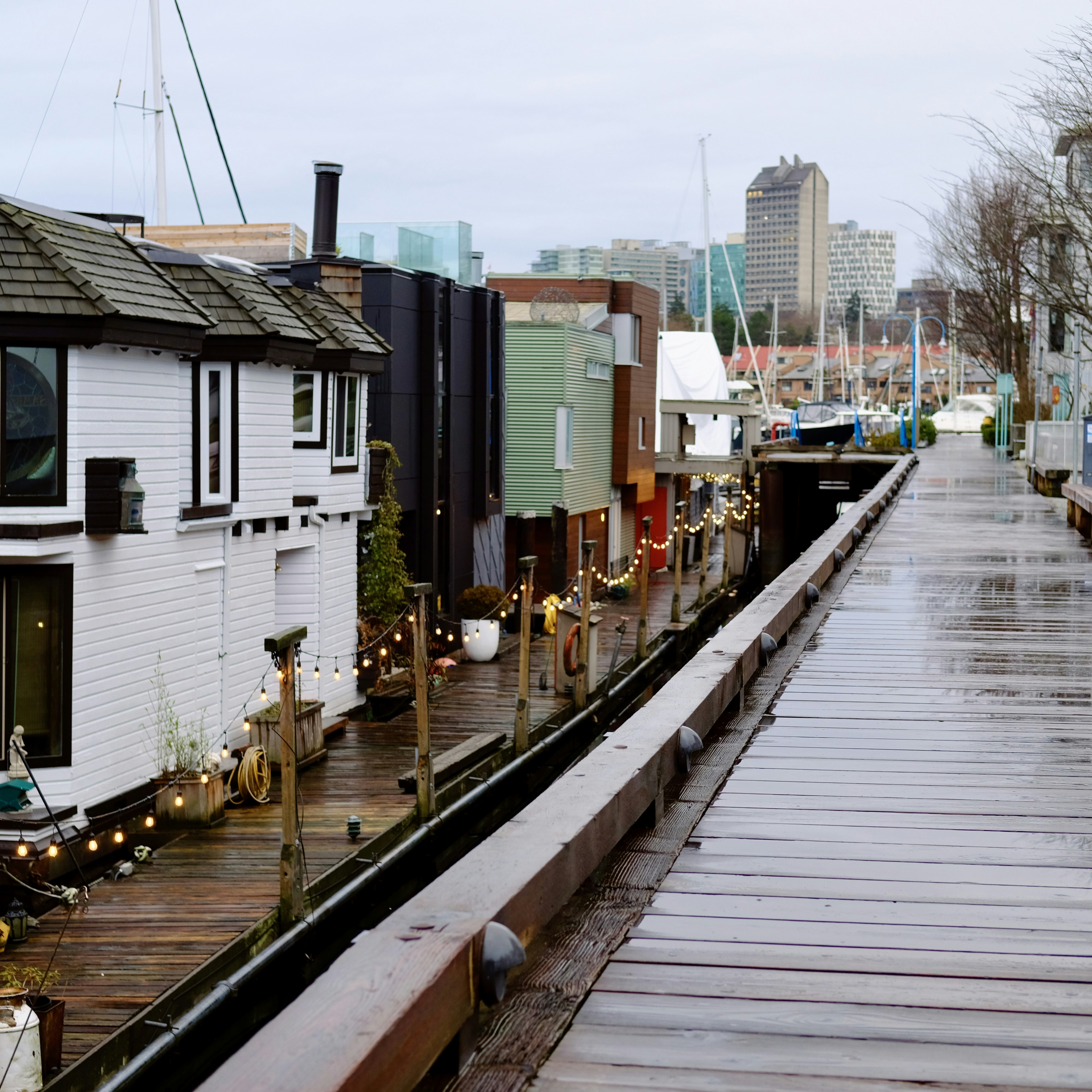 a row of houses on a rainy day