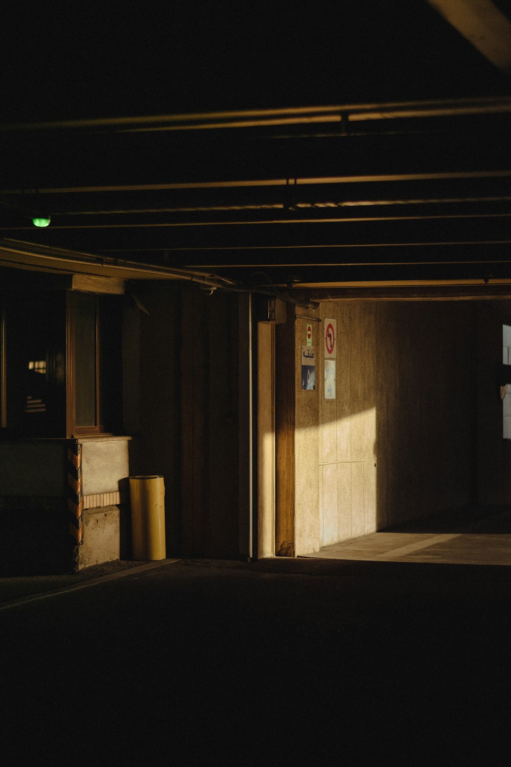 an empty parking garage with the door open