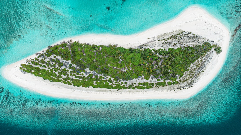 an aerial view of an island in the middle of the ocean