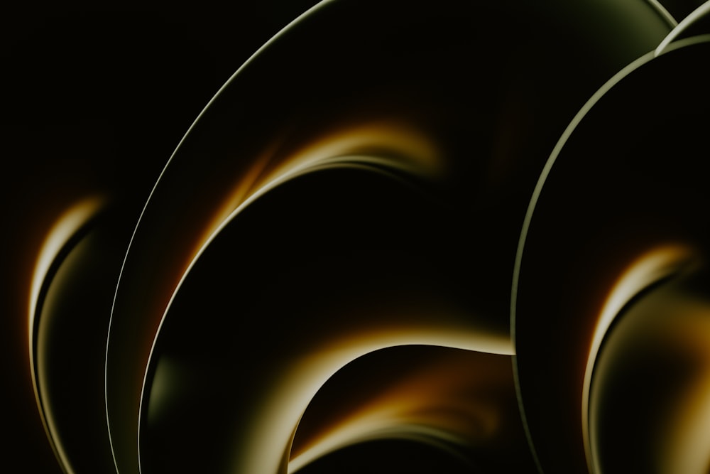 a close up of a black and gold background
