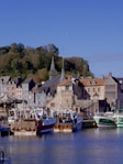 a group of boats that are sitting in the water