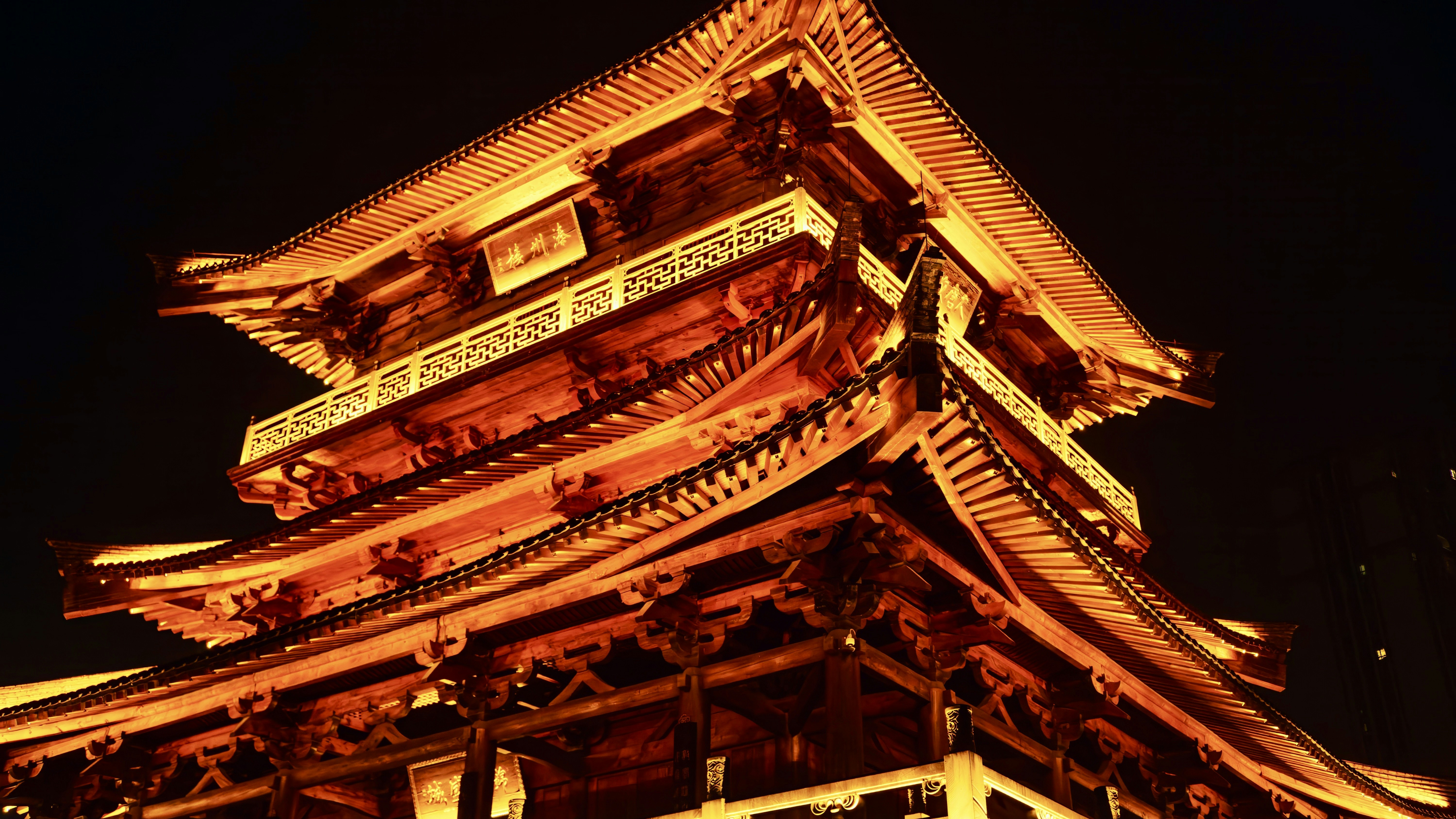 a tall tower with a clock on top of it
