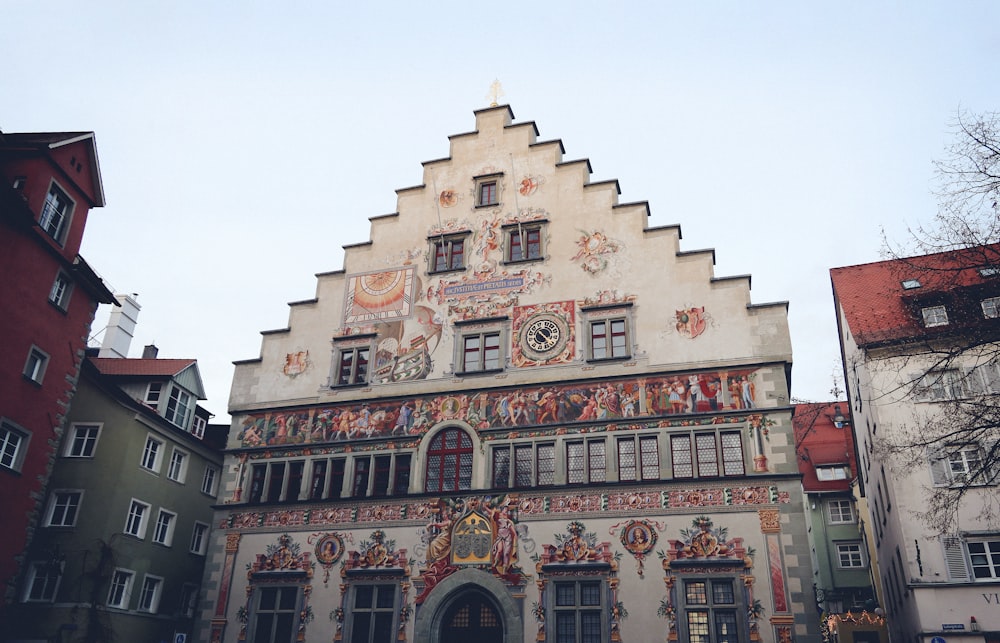 a building with a clock on the side of it