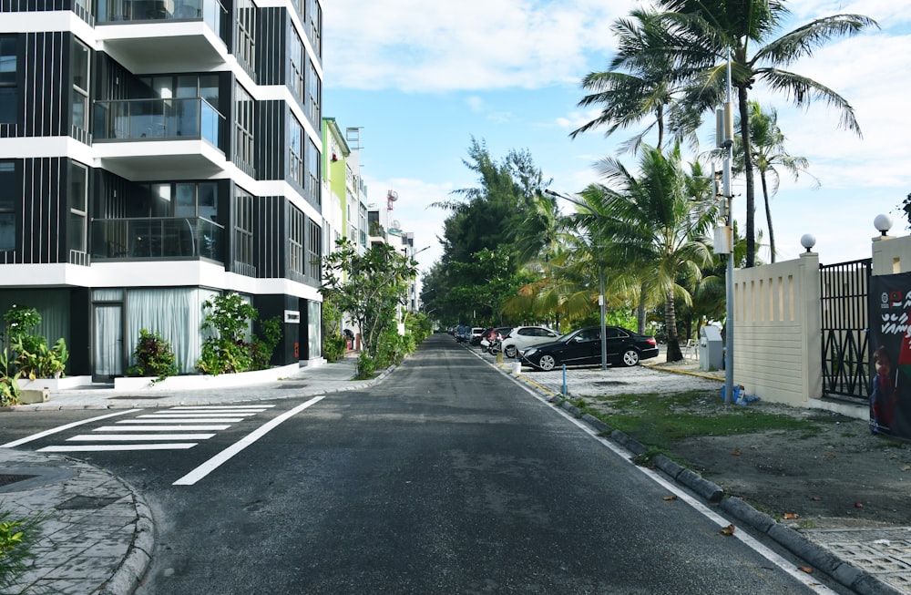 a street with cars parked on both sides of it