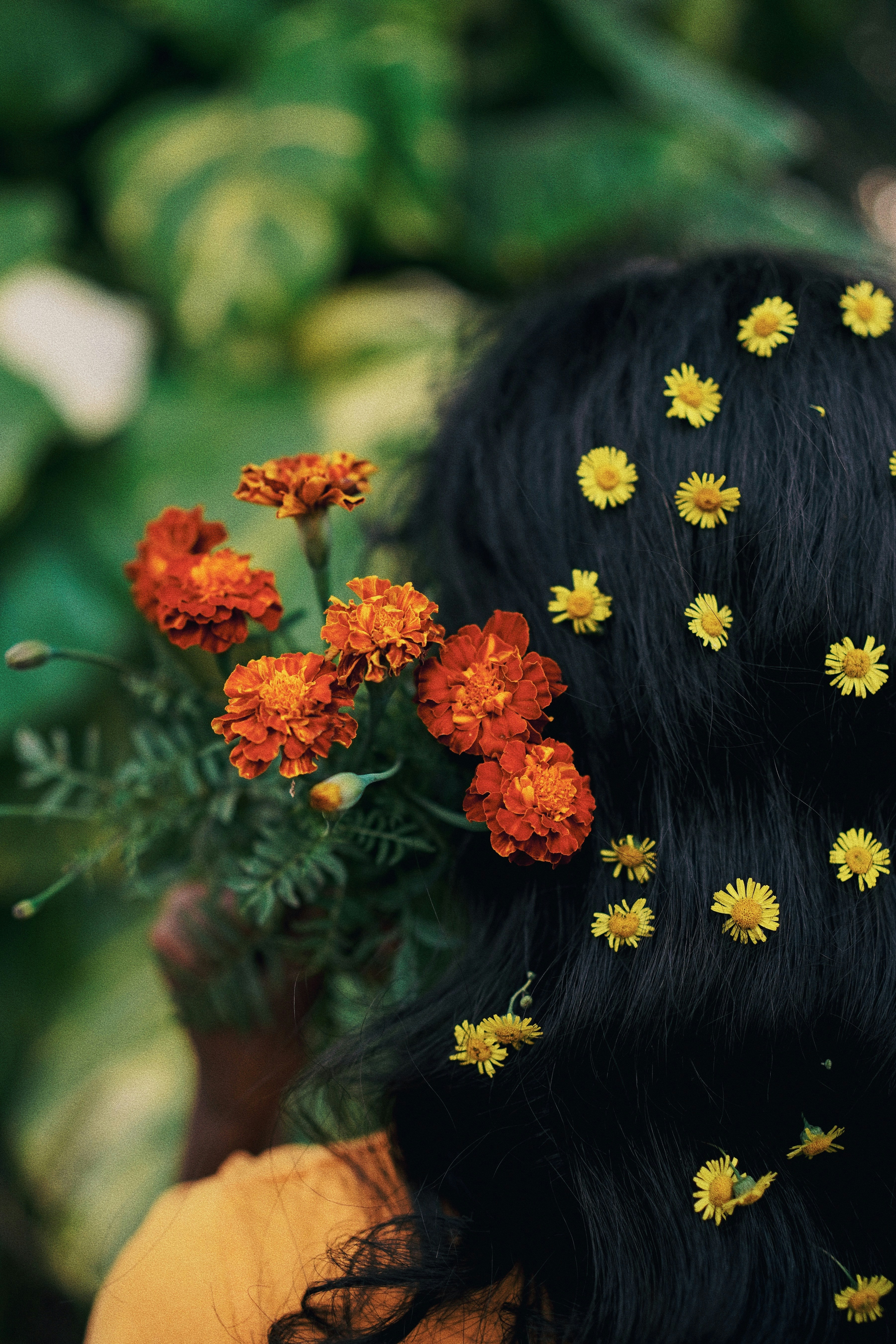 a woman with flowers in her hair