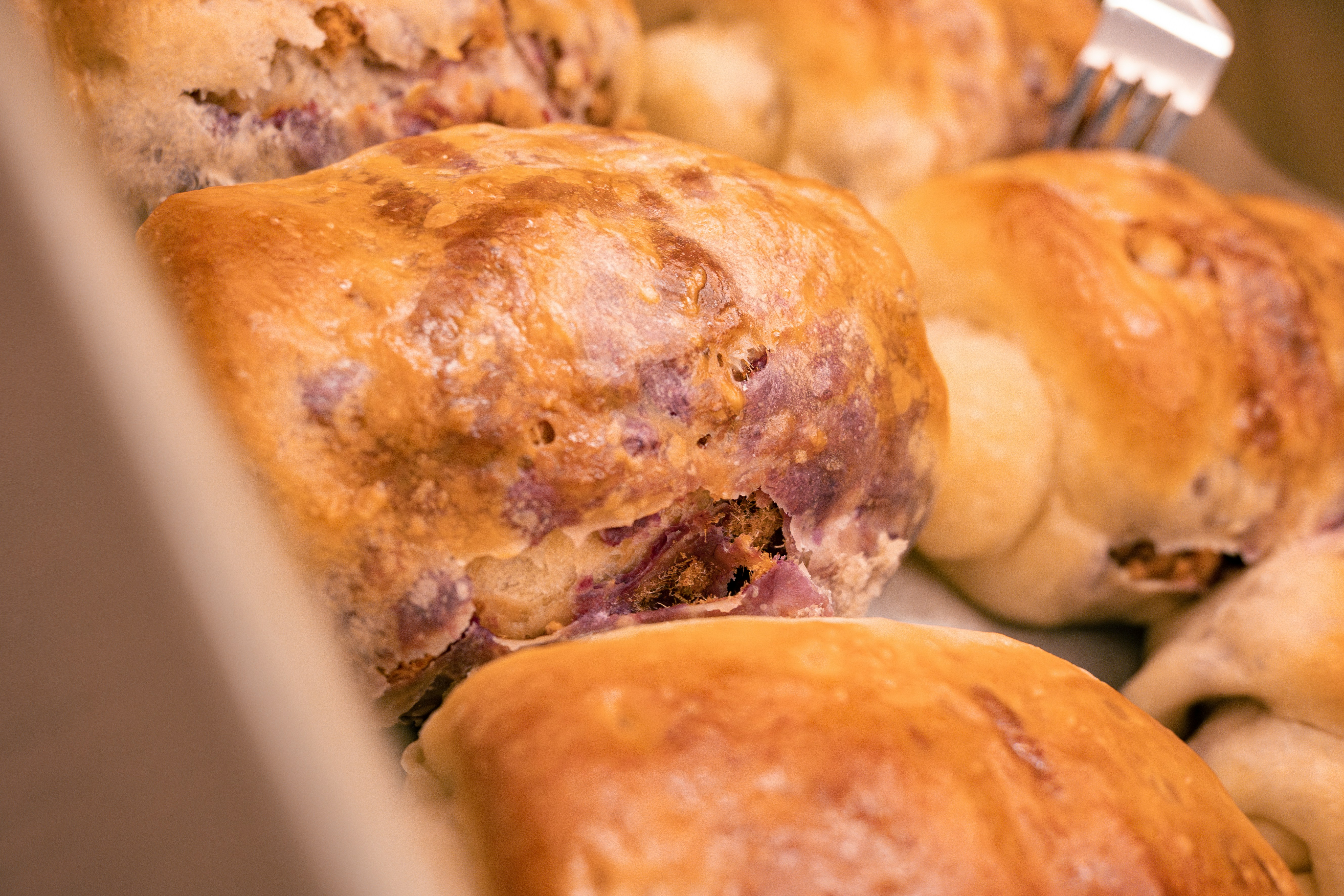 a close up of a tray of pastries