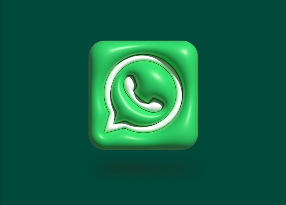 a green square icon with a phone in the middle