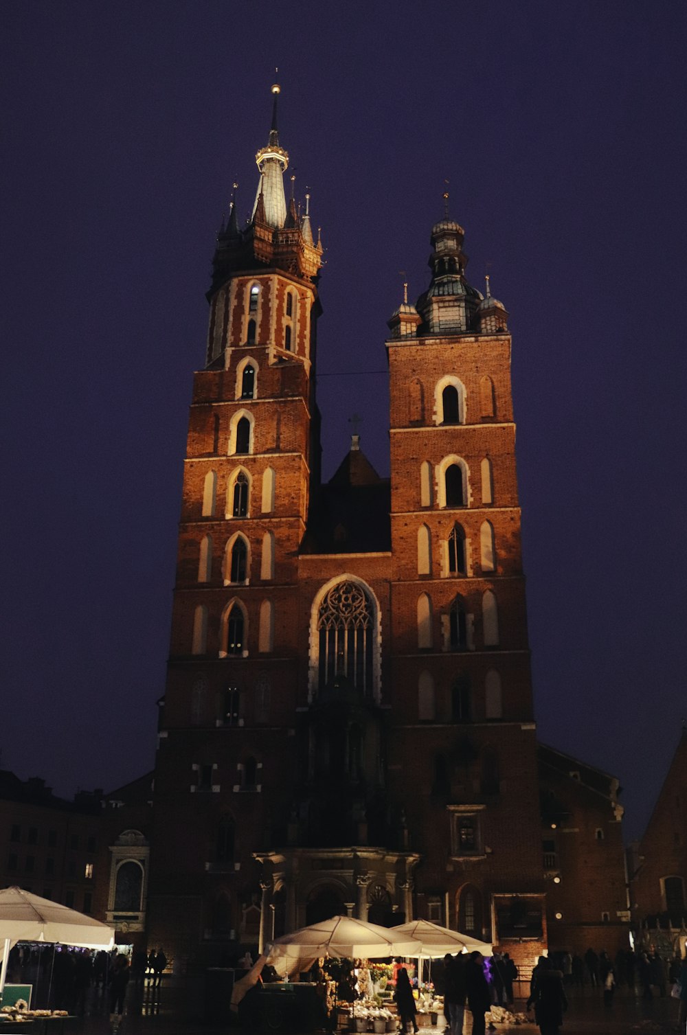 a very tall building with a clock on it's side