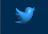 a blue twitter logo on a dark blue background