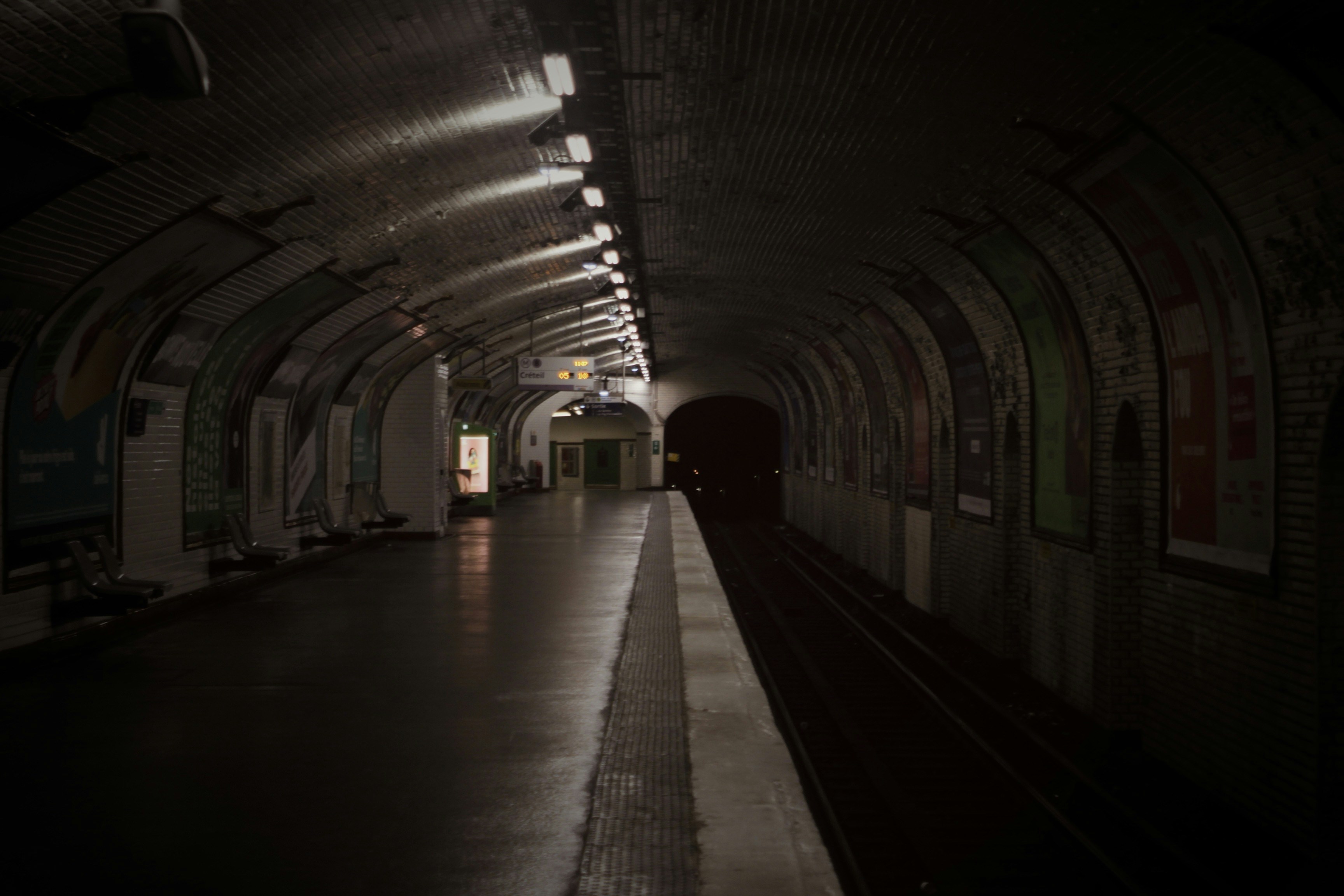 a train is coming out of a tunnel, Parisian Metro Station