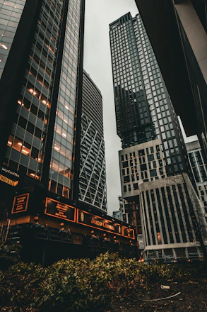 a group of tall buildings next to each other