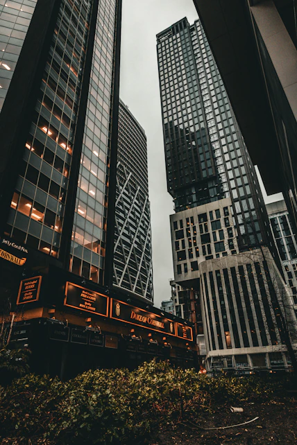 a group of tall buildings next to each other