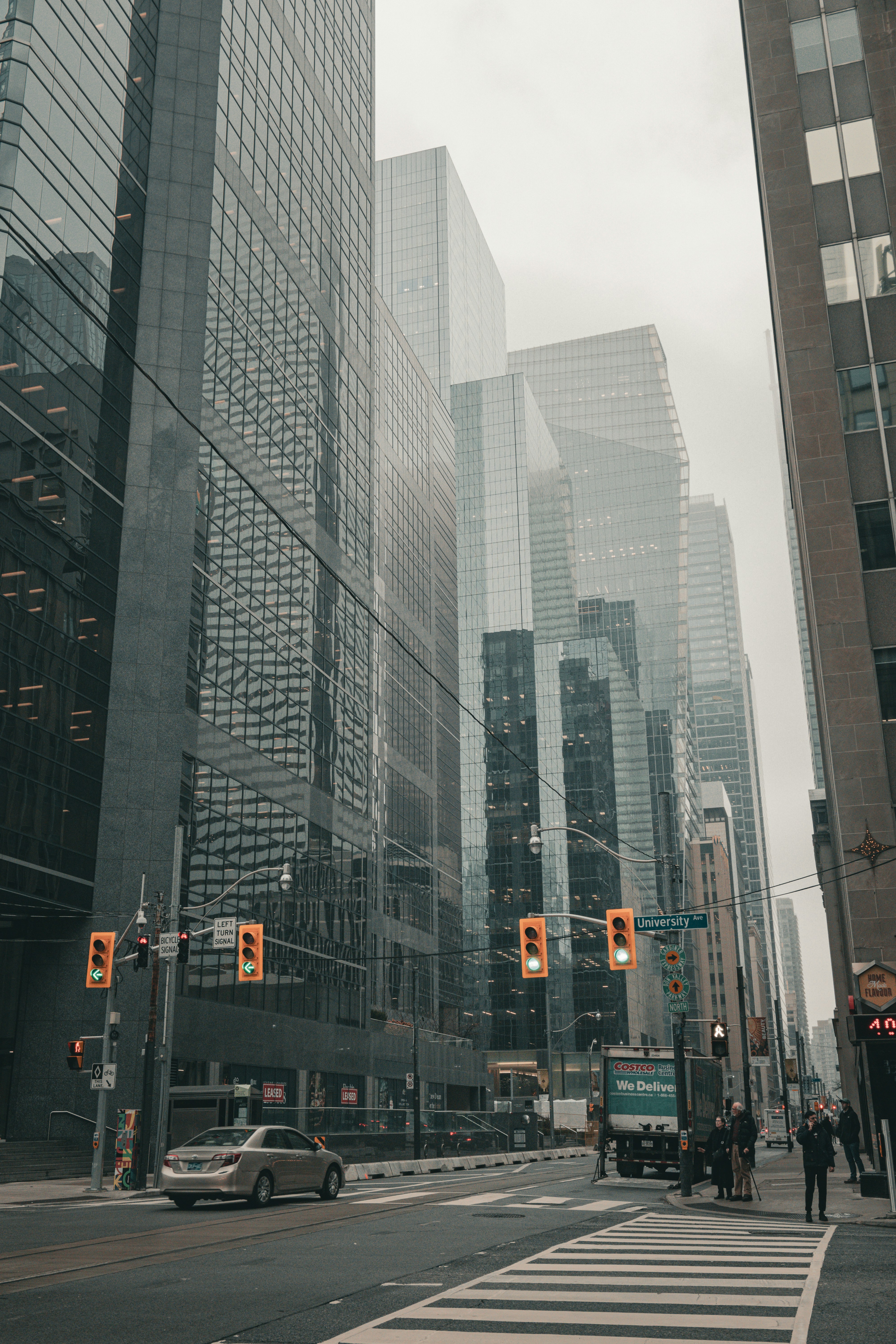 a city street filled with lots of tall buildings