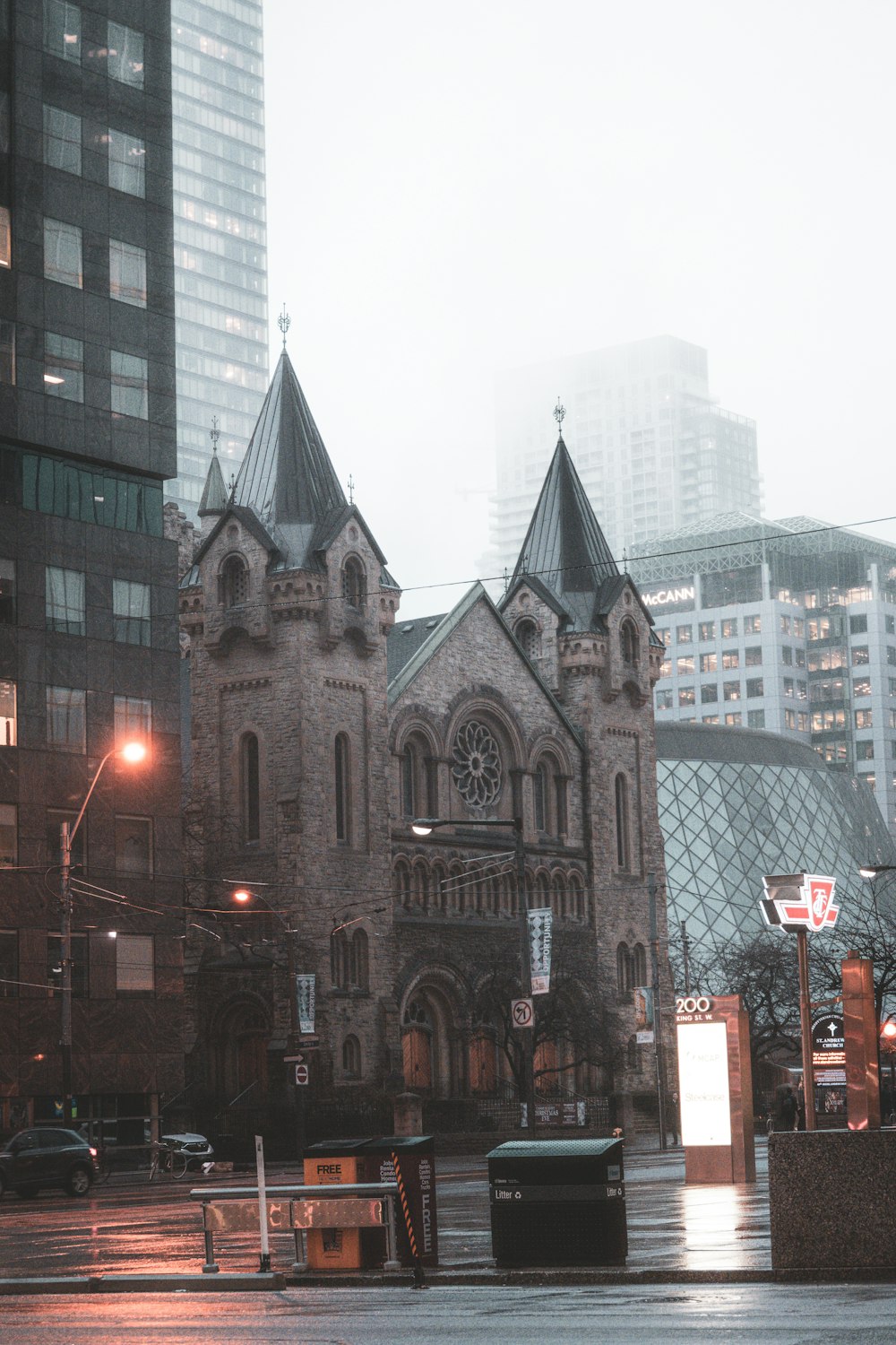 an old church in the middle of a city