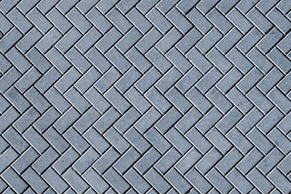 a close up of a blue brick wall
