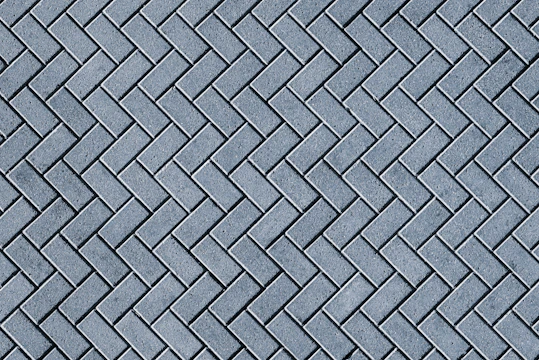 a close up of a blue brick wall