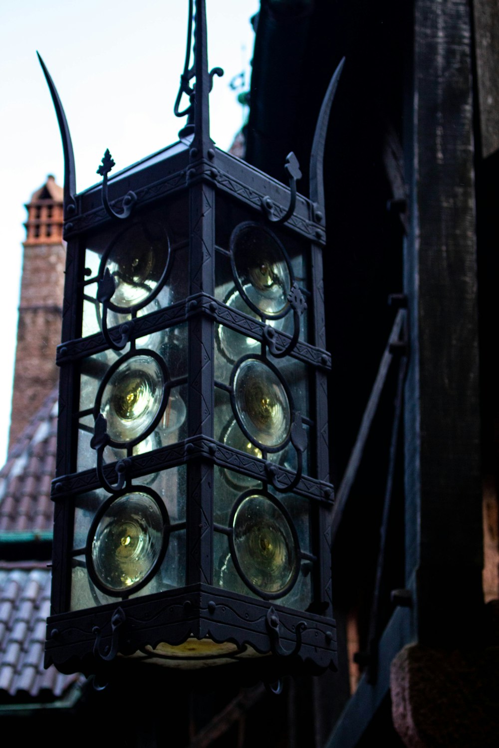 a light hanging from the side of a building