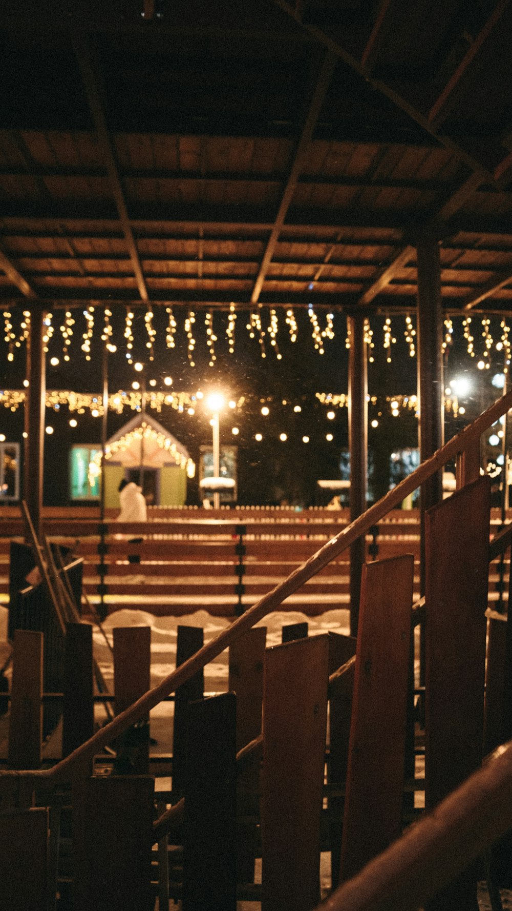 a picture of a building with lights in the background