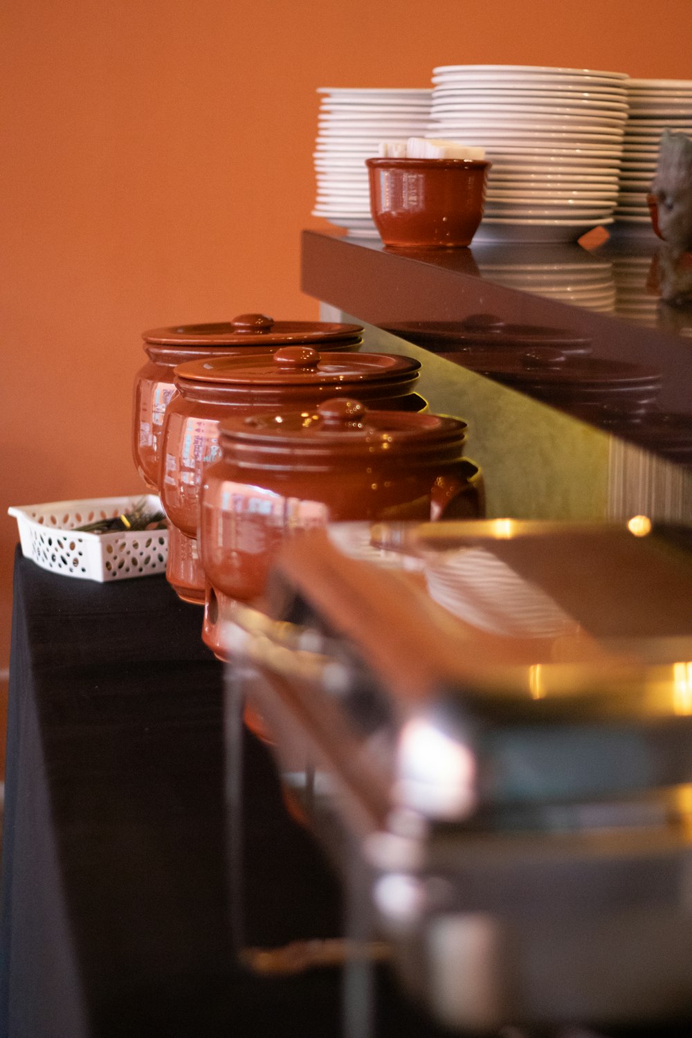 a table topped with lots of plates and bowls