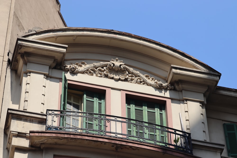 a building with a balcony and balcony balconies