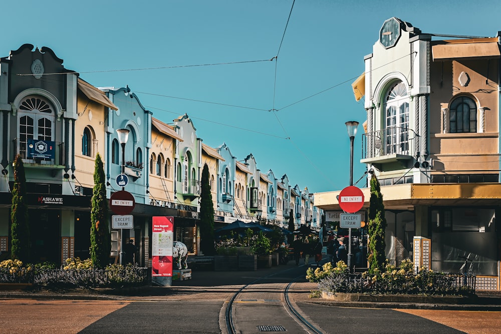 a street with a train track going through it