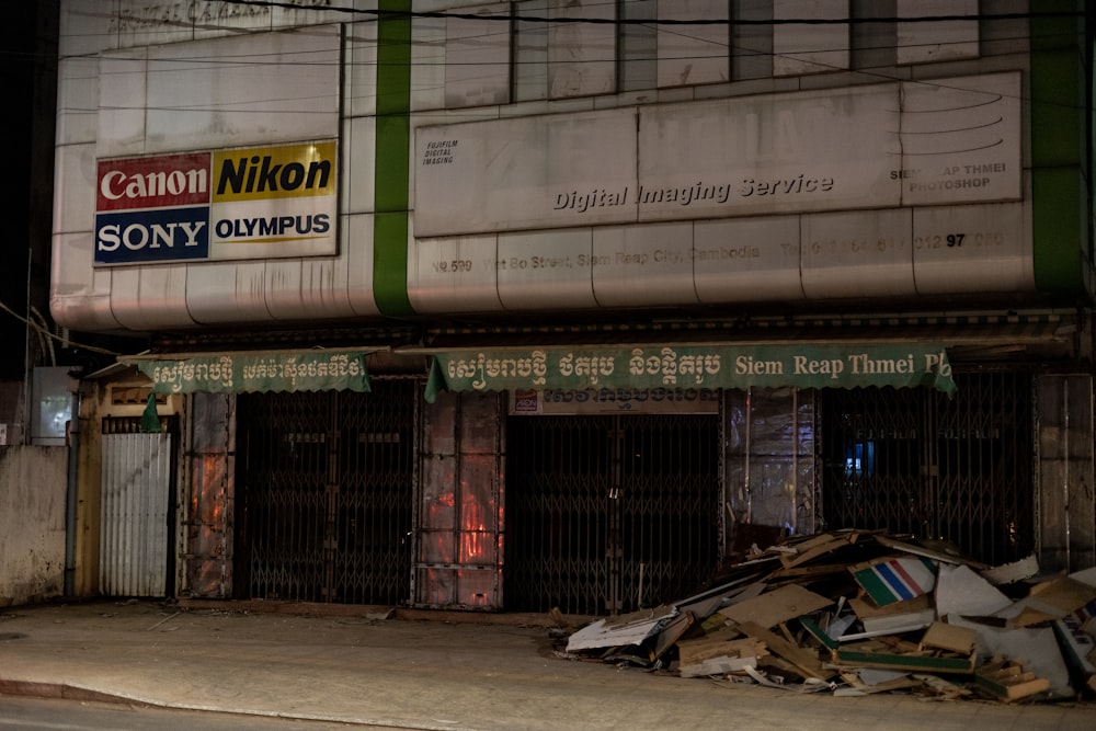 a pile of junk sitting in front of a building